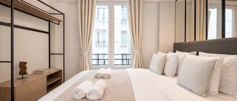 1 habitación, tabla de planchar con plancha, cuna de viaje y wifi