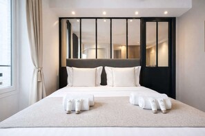 1 habitación, tabla de planchar con plancha, cuna de viaje y wifi