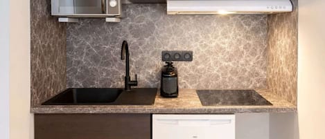 Fridge, microwave, coffee/tea maker, toaster