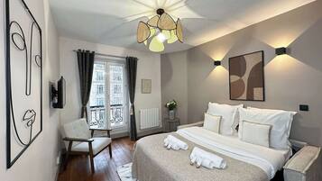 1 slaapkamer, een strijkplank/strijkijzer, reisbedje, wifi