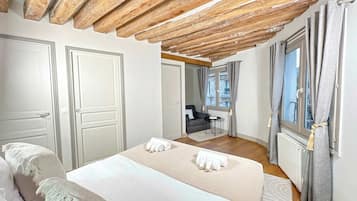 1 habitación, tabla de planchar con plancha, cuna de viaje y wifi