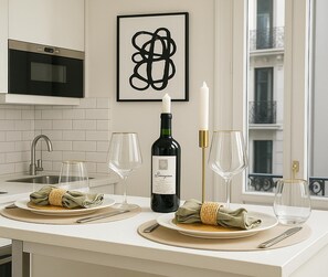 Fridge, microwave, stovetop, coffee/tea maker