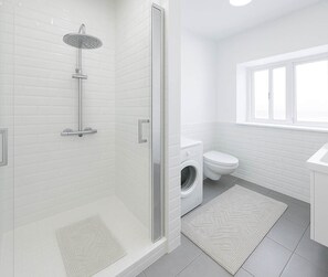 Shower, hair dryer, towels, soap