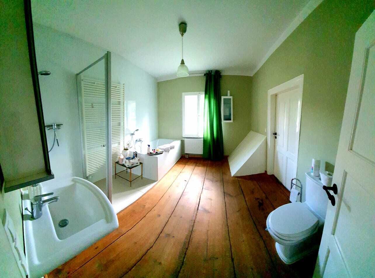 Bathtub, hair dryer, towels, soap