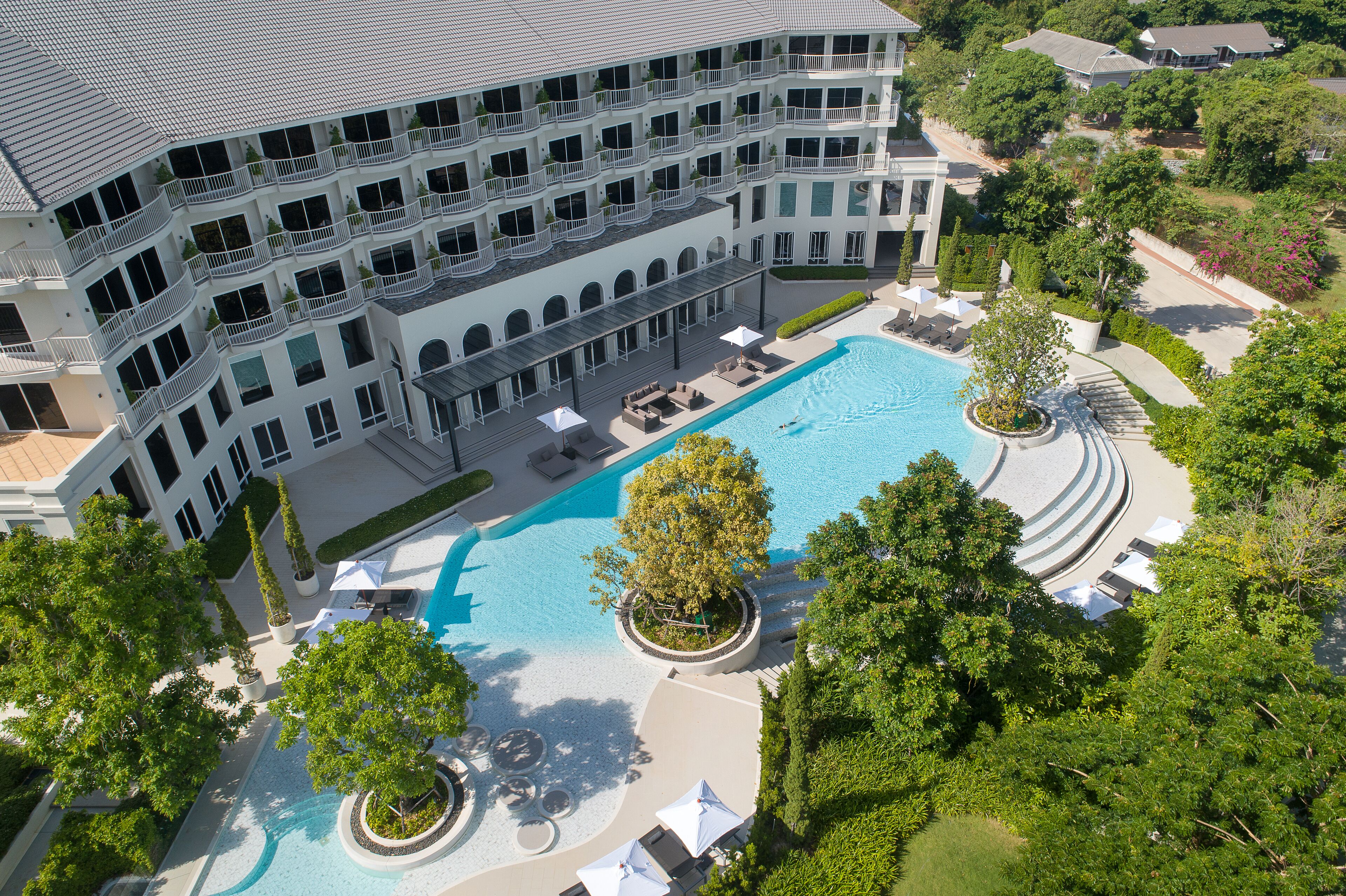 Outdoor pool, open 7:00 AM to 6:00 PM, pool loungers