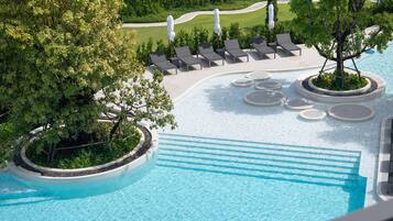 Outdoor pool, open 7:00 AM to 6:00 PM, pool loungers