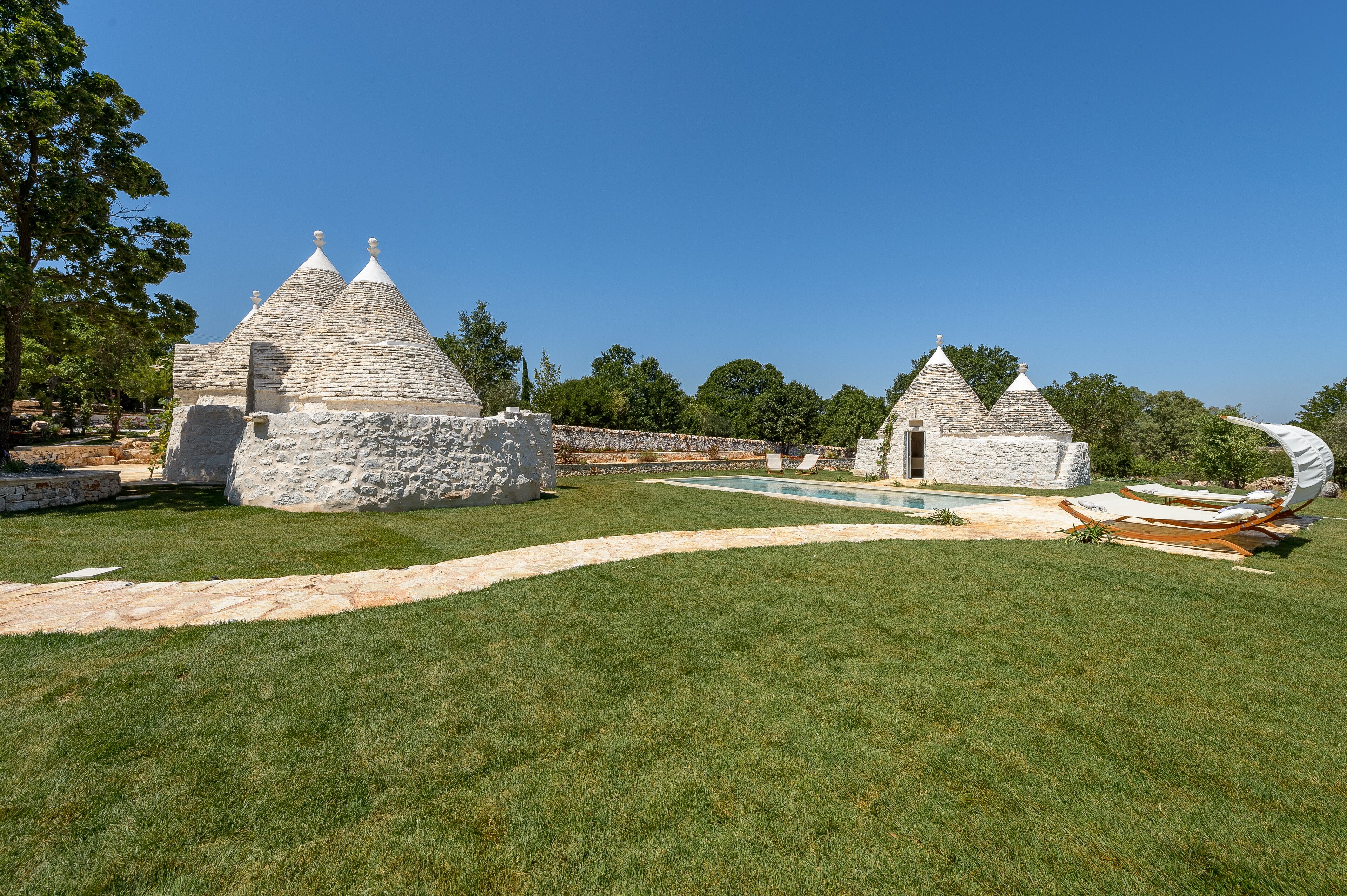 Frette Italian sheets, premium bedding, down comforters