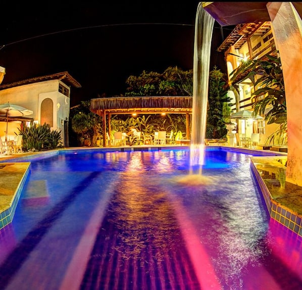 Outdoor pool, open 10:00 AM to 10:00 PM, pool loungers