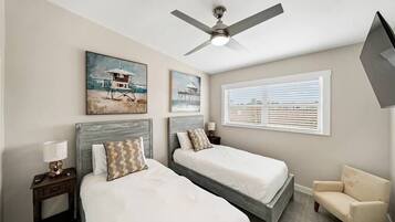 2 habitaciones, tabla de planchar con plancha, cuna de viaje y wifi