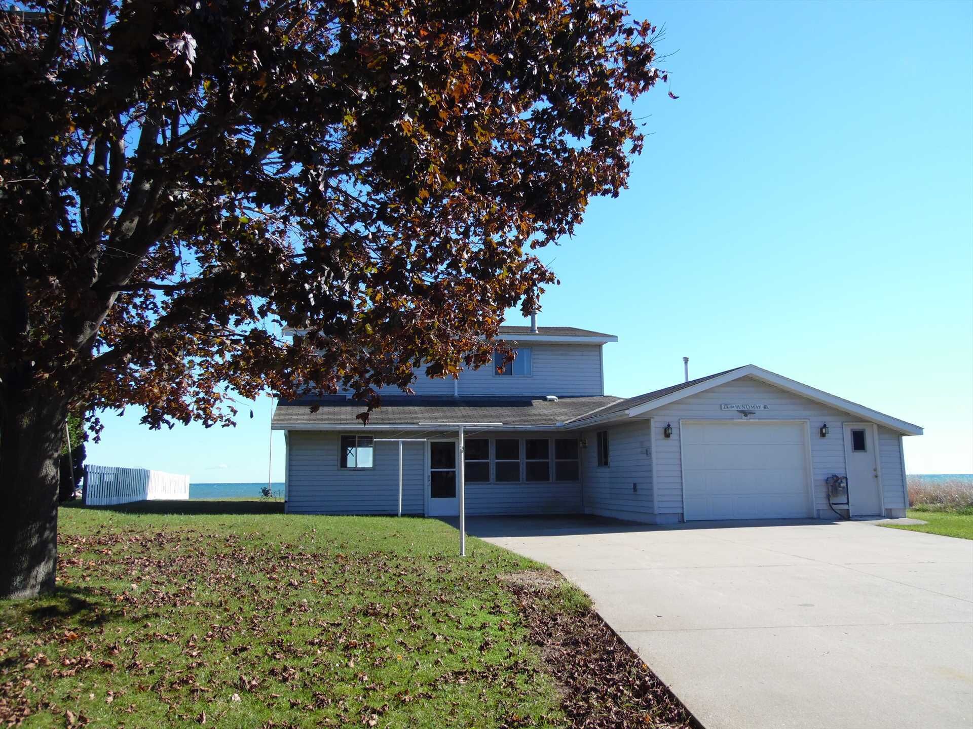 Located on Lake Huron Sandy Beach! Home sleeps up to 9!