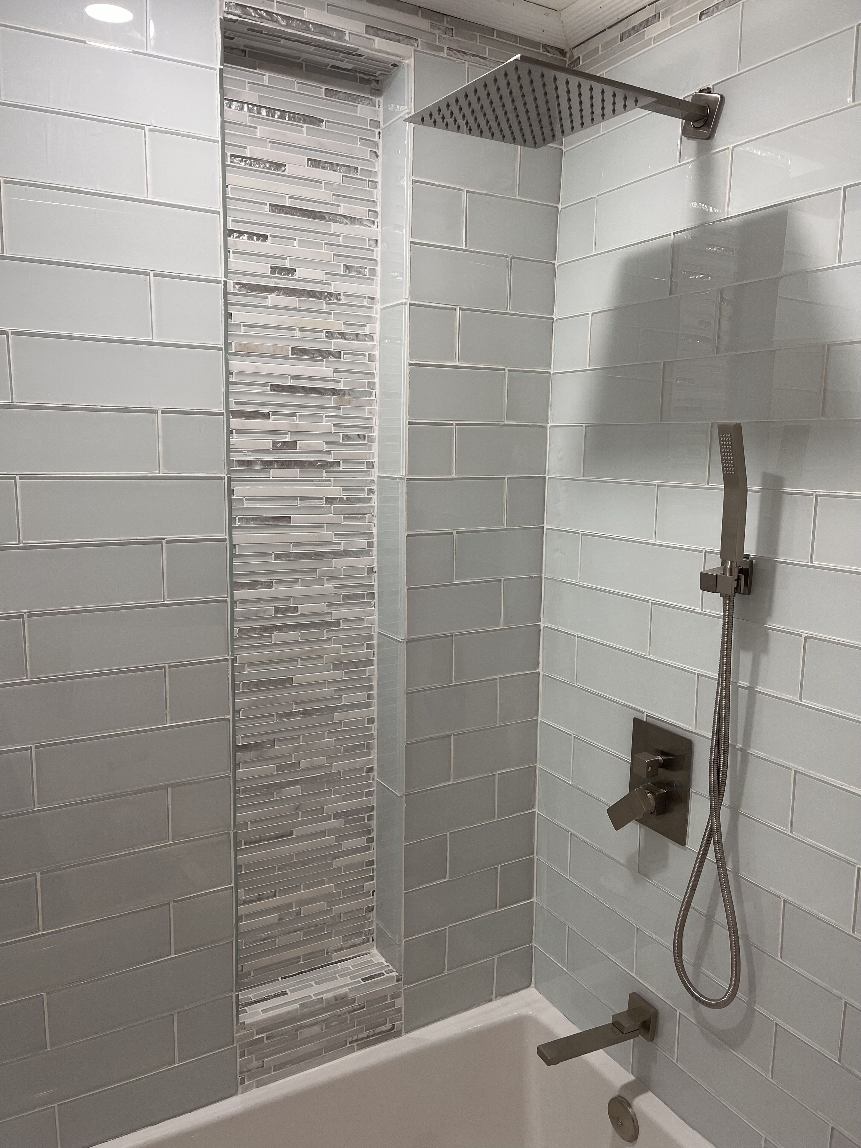 Combined shower/tub, hair dryer, towels, toilet paper