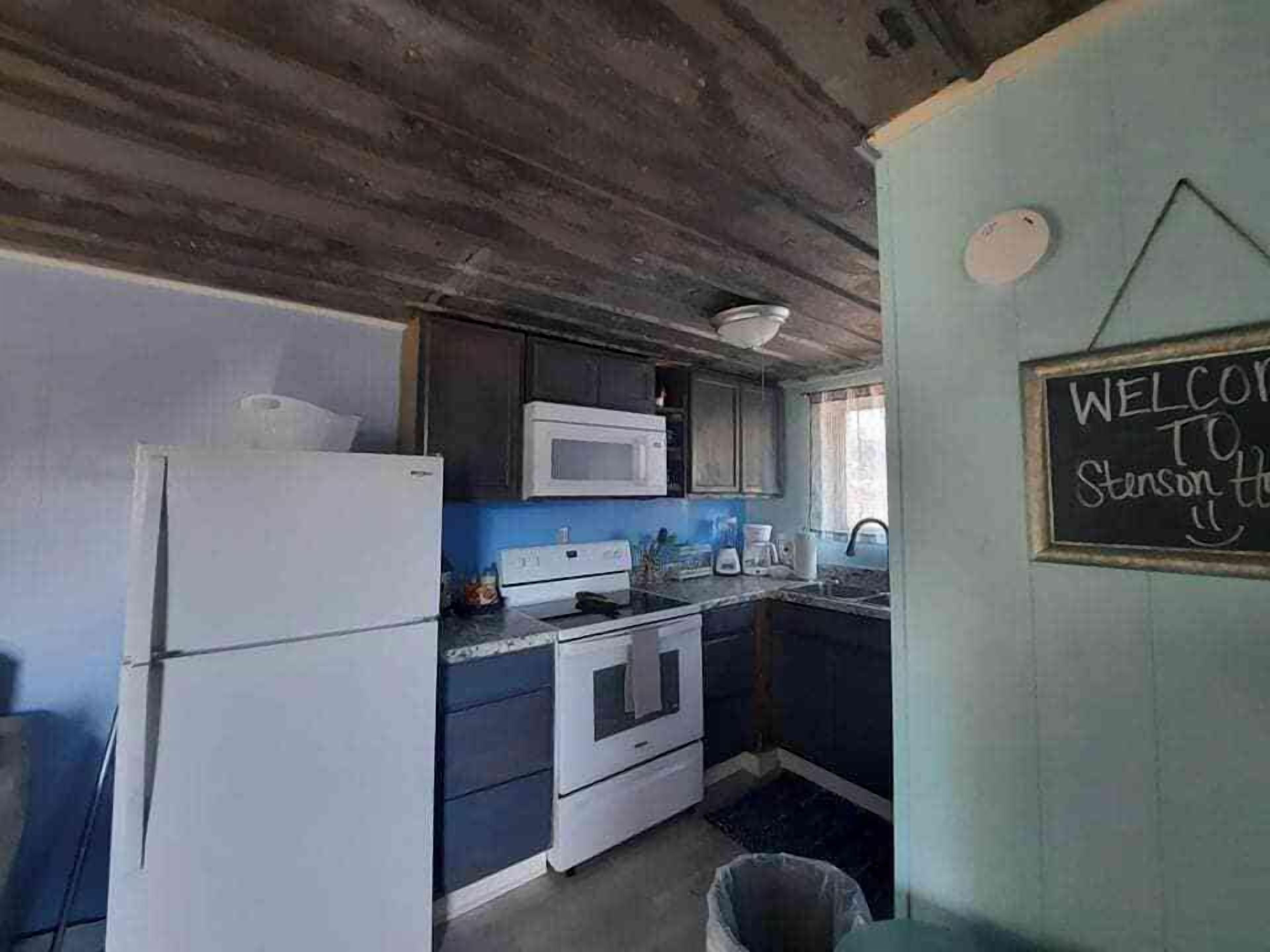 Fridge, coffee/tea maker, cookware/dishes/utensils