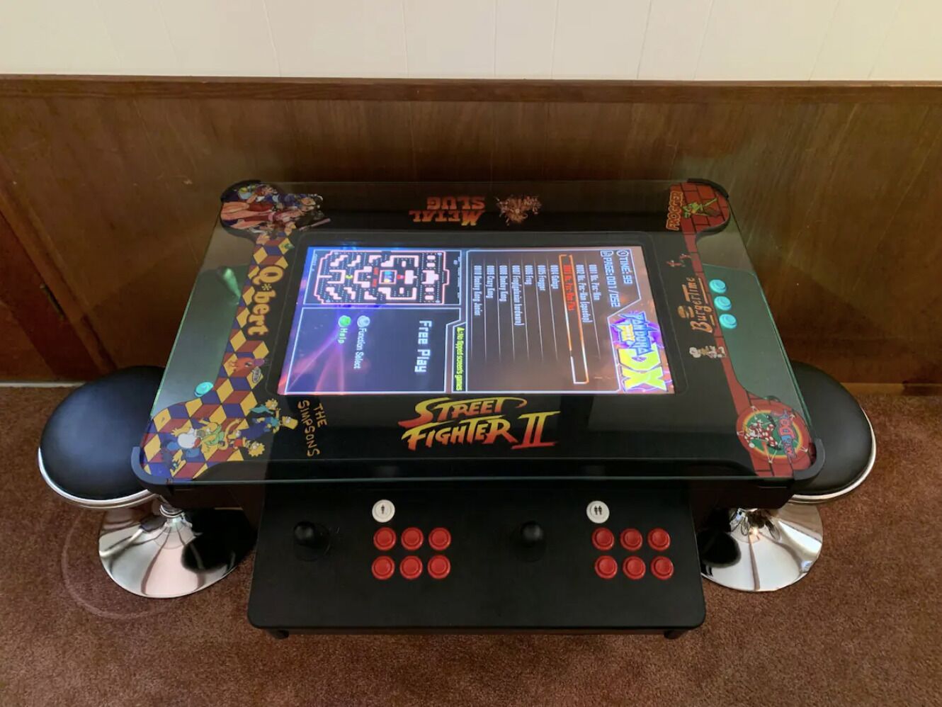 A Street Fighter II arcade machine with a colorful design and multiple buttons.
