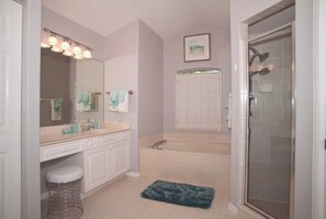 Combined shower/bathtub, hair dryer, towels, soap