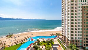 A hotel with a pool, beach, and ocean view. - Stunning views over the bay from Grand Venetian  (Puerto Vallarta)