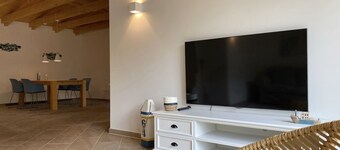 "Ankerplatz" vacation apartment with large garden in the heart of Pilsum