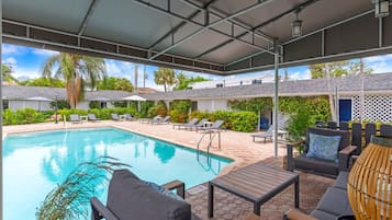 Outdoor pool, open 8:00 AM to 10:00 PM, pool umbrellas, sun loungers