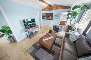 Family Apartment | Living area | 32-inch Smart TV with cable channels