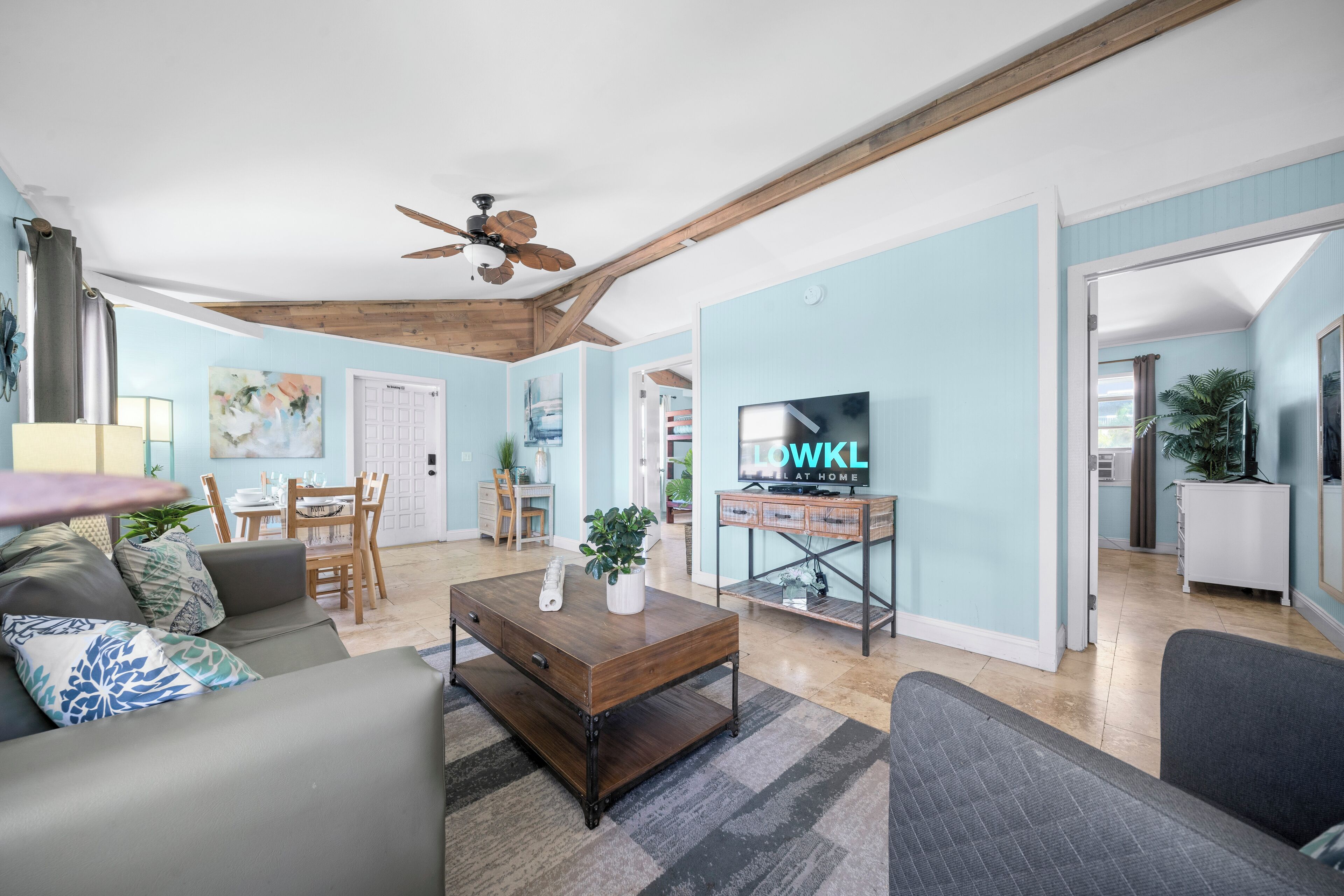 Family Apartment | Living area | 32-inch Smart TV with cable channels