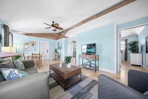 Family Apartment | Living area | 32-inch Smart TV with cable channels