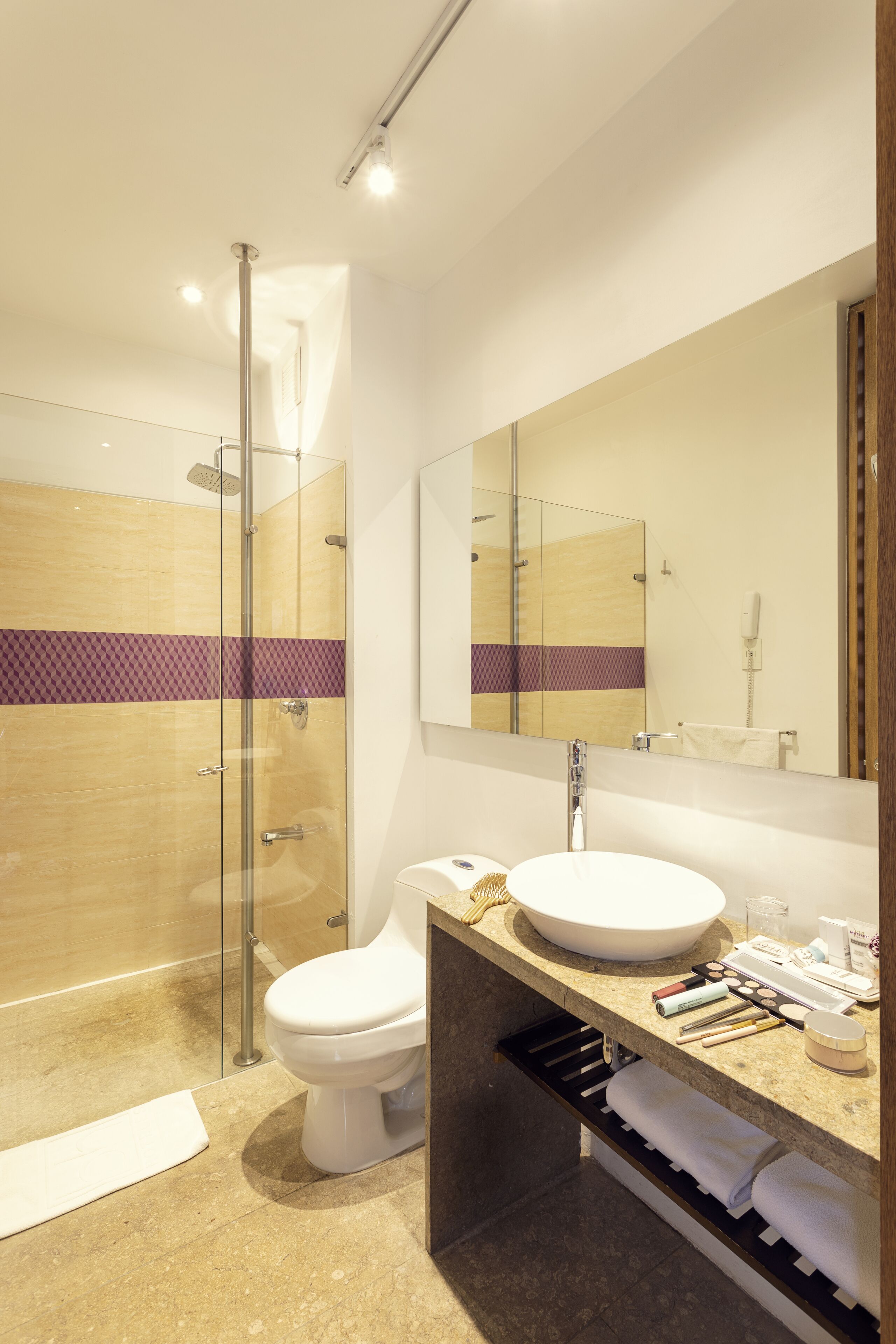 standard room | bathroom | rainfall showerhead, hair dryer, towels, soap