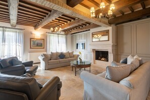 Flat-screen TV, fireplace, video games, stereo
