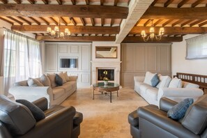 Flat-screen TV, fireplace, video games, stereo