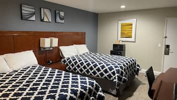 Standard Double Room, 2 Queen Beds | Living area | 40-inch flat-screen TV with cable channels, TV