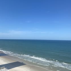 On the beach, sun-loungers, beach towels