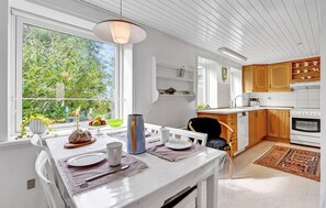 Fridge, stovetop, dishwasher, coffee/tea maker