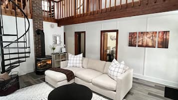 Smart TV, fireplace, foosball, books