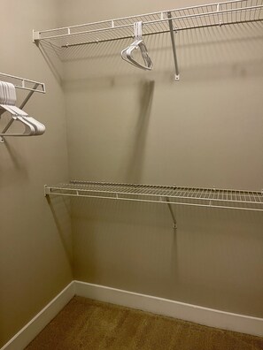 Simple, functional space with two shelving units for storage.