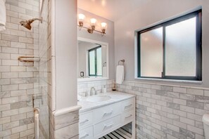 Shower, hair dryer, towels, soap