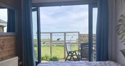 6 personen Haus Aurora mit Blick auf das Lauwersmeer, Ufergrundstück