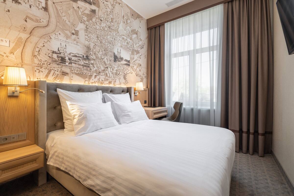 standard double room | memory-foam beds, minibar, in-room safe, individually decorated