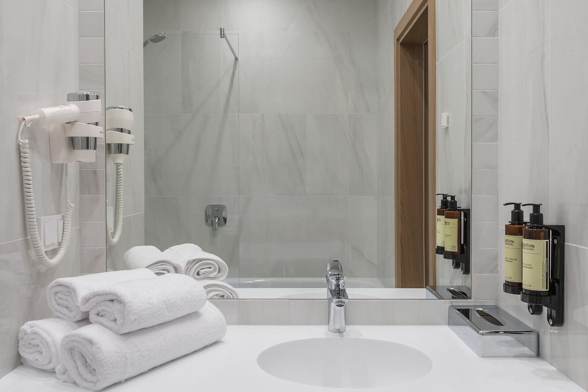 free toiletries, hair dryer, slippers, towels