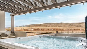 A hot tub with a view of a desert landscape. - Rock n' Relax at Desert Color by RedAwning (St. George)