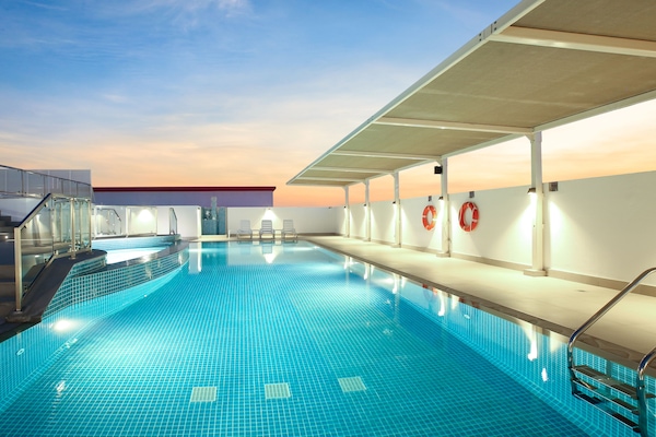 Outdoor pool, sun loungers, lifeguards on site