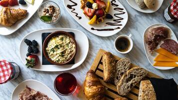 Daily buffet breakfast (USD 16.00 per person)