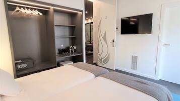 Premium bedding, down comforters, Select Comfort beds, in-room safe