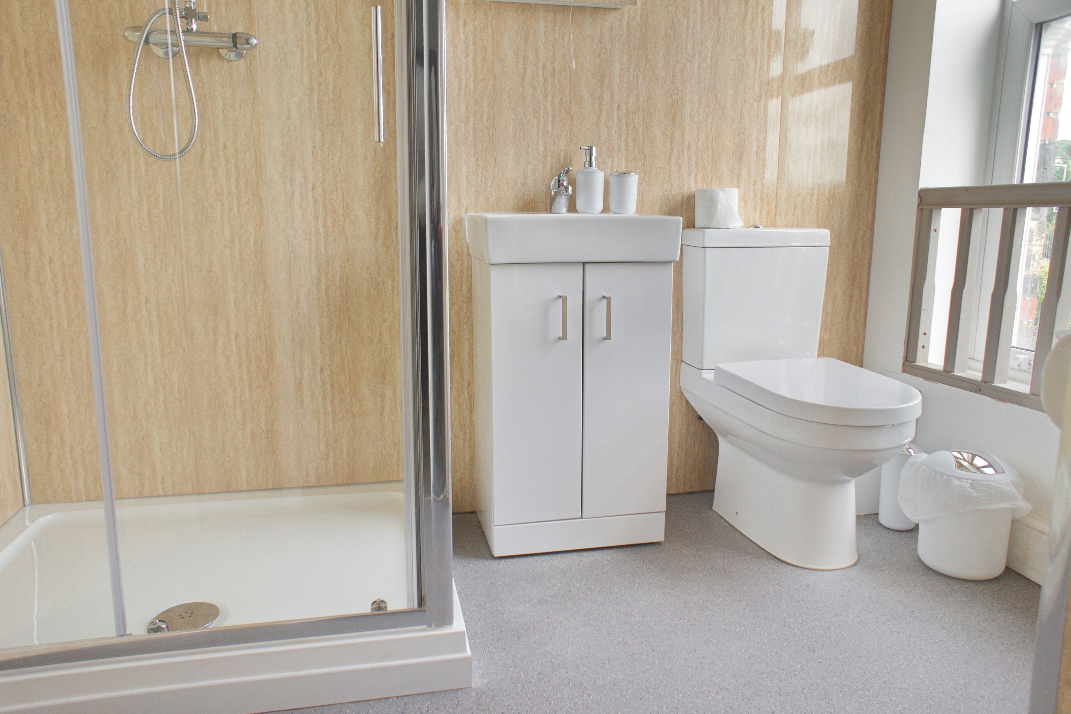 superior triple room | bathroom | shower, hair dryer, towels