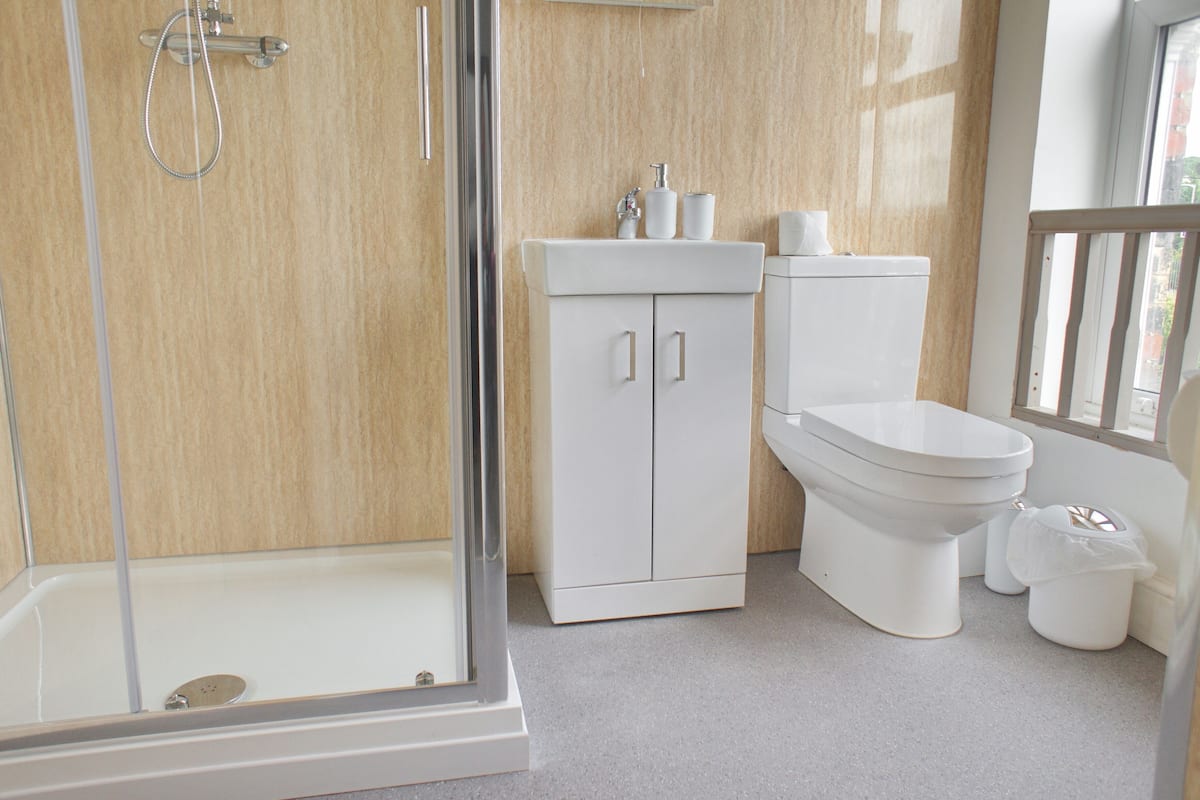 superior triple room | bathroom | shower, hair dryer, towels