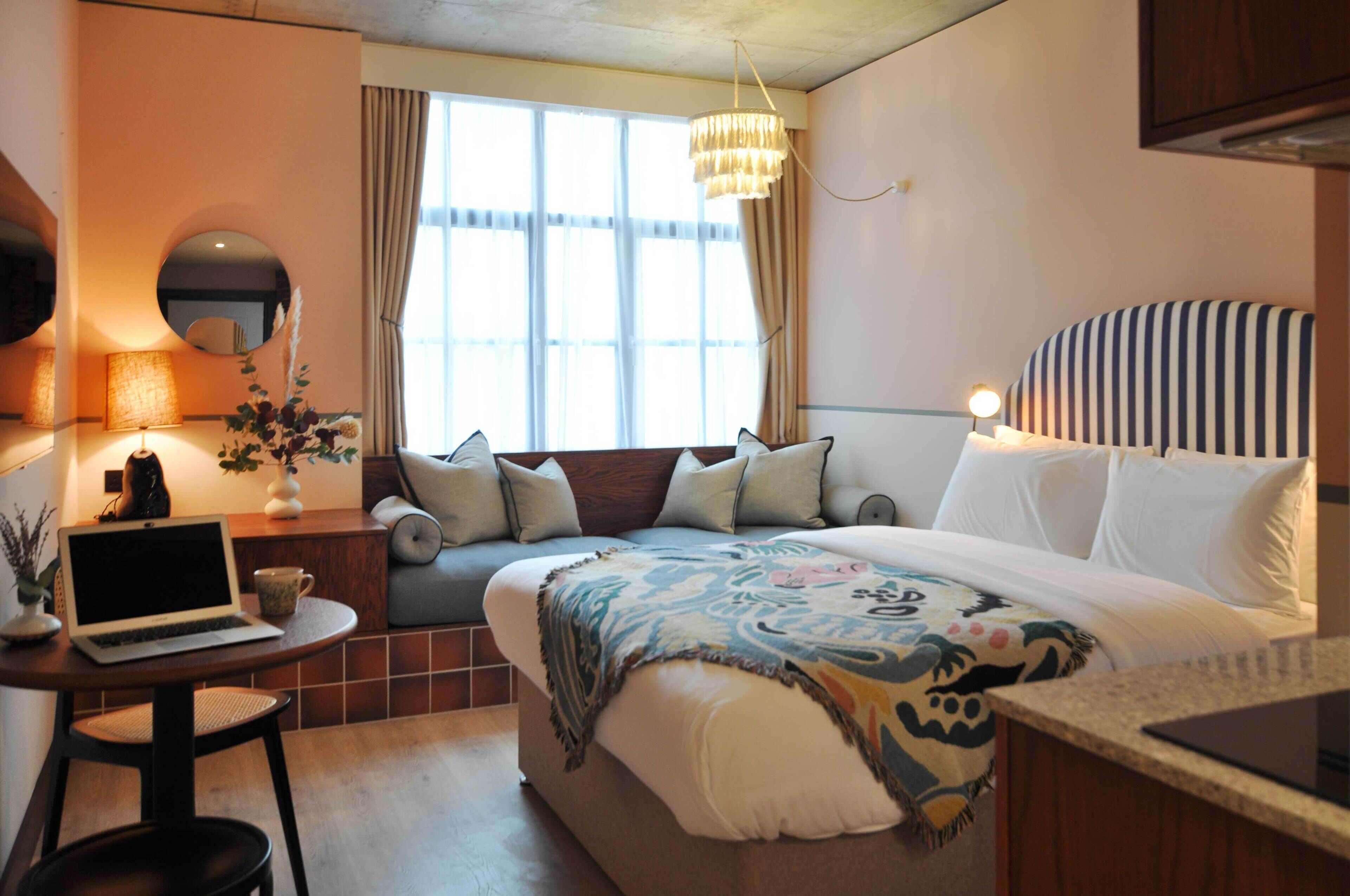 studio | premium bedding, memory-foam beds, in-room safe, individually decorated