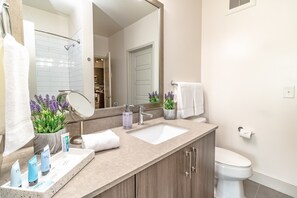 Combined shower/bathtub, hair dryer, towels, soap