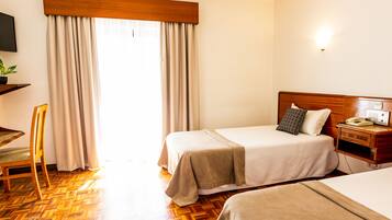 Desk, free WiFi, bed sheets