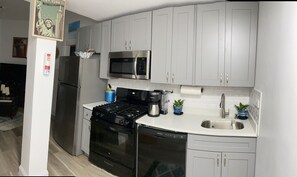 Fridge, dishwasher, coffee/tea maker, waffle maker