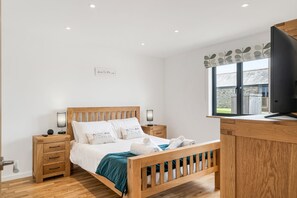 2 habitaciones, tabla de planchar con plancha, cuna de viaje y wifi