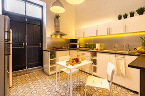 Full-size fridge, microwave, toaster, waffle maker