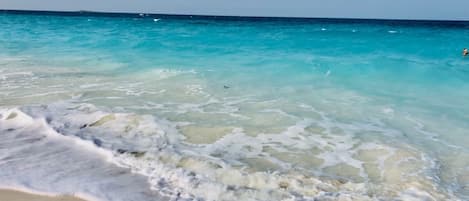 On the beach, beach towels