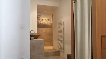 Bathtub, hair dryer, soap, shampoo